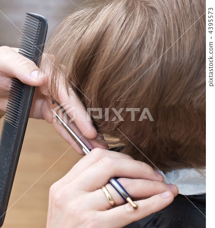 cutting hair at the barber cutting hair at the barber 4395573