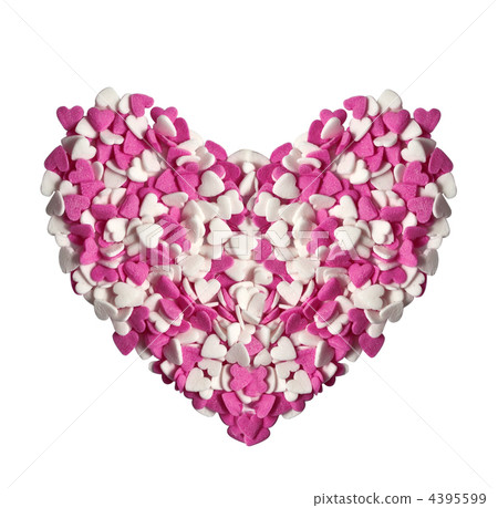 Heart of sugar confectionery in the shape of heart Heart of sugar confectionery in the shape of heart 4395599