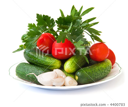 Fresh vegetables, cucumbers, tomatoes, garlic and fresh herbs, isolated on a white background. Fresh vegetables, cucumbers, tomatoes, garlic and fresh herbs, isolated on a white background. 4400783