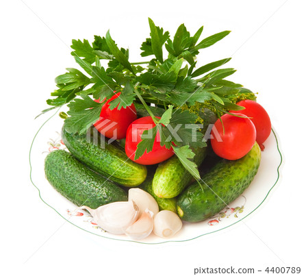Fresh vegetables, cucumbers, tomatoes, garlic and fresh herbs, isolated on a white background. Fresh vegetables, cucumbers, tomatoes, garlic and fresh herbs, isolated on a white background. 4400789