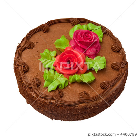 Chocolate cake with two cream-colored roses. Isolated on white background. Chocolate cake with two cream-colored roses. Isolated on white background. 4400799