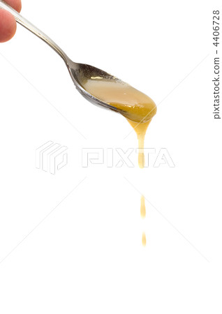 Honey drip from spoon 4406728