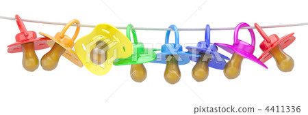 Row of babies dummies on rope. Row of babies dummies on rope. 4411336
