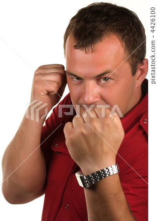 man in a pose of a boxer man in a pose of a boxer 4426100