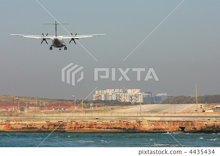Passenger airplane landing on runway. 4435434