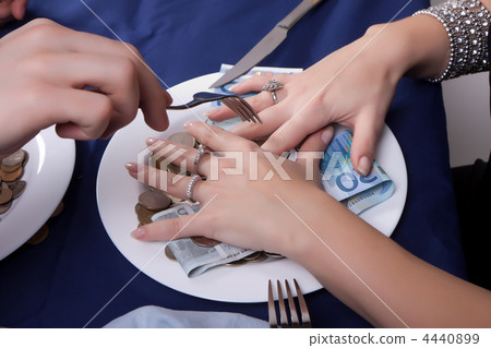 hand with a fork for the money runs hand with a fork for the money runs 4440899