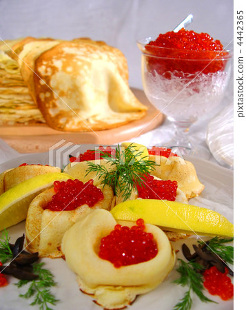 Pancakes with red caviar 4442365