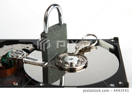 Padlock and key on hard drive 4443541