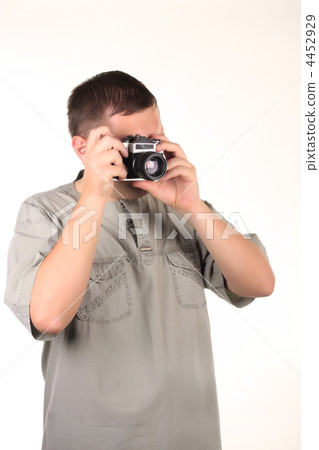 Man with old photocamera. Man with old photocamera. 4452929