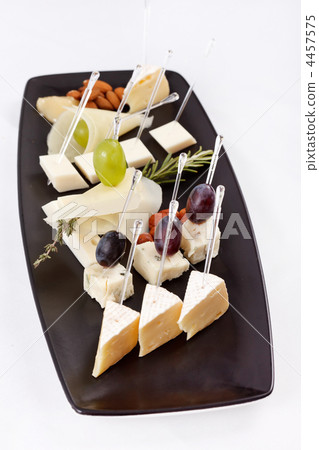 plate with different types cheese plate with different types cheese 4457575