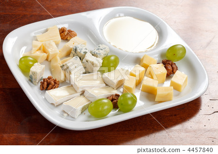 Cheese plate with grapes and honey 4457840