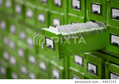 Old wooden card catalogue with one opened drawer Old wooden card catalogue with one opened drawer 4463143