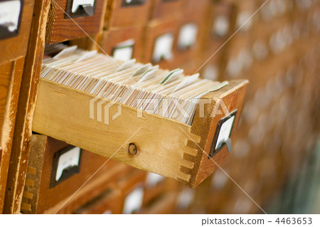 Old wooden card catalogue with one opened drawer 4463653