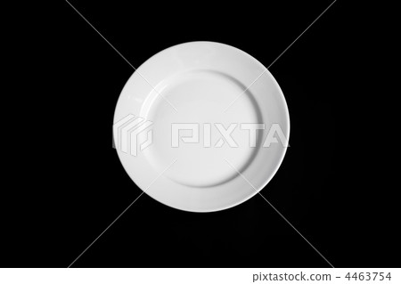 White round plate isolated on black background White round plate isolated on black background 4463754