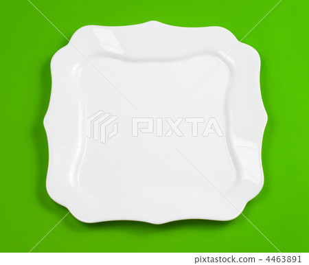 White figured plate on green background 4463891