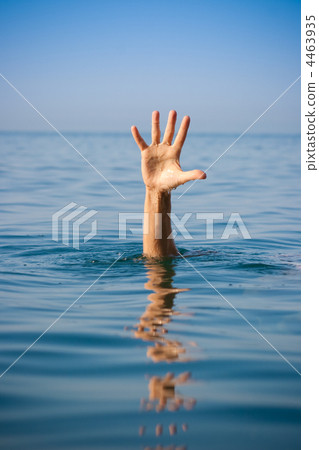 single hand of drowning man in sea asking for help 4463935
