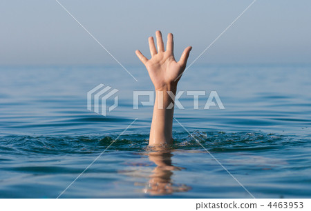 single hand of drowning man in sea asking for help 4463953