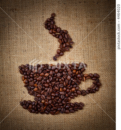 coffee cup made from beans on burlap background 4464020