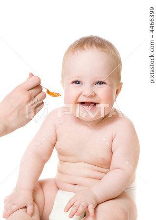 smiley baby boy  feeding isolated on white 4466399