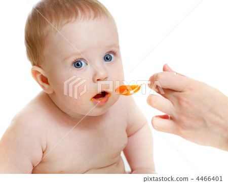 baby boy feeding isolated on white baby boy feeding isolated on white 4466401