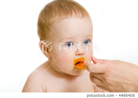 baby boy feeding isolated on white baby boy feeding isolated on white 4466408