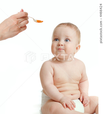 baby boy feeding isolated on white baby boy feeding isolated on white 4466424