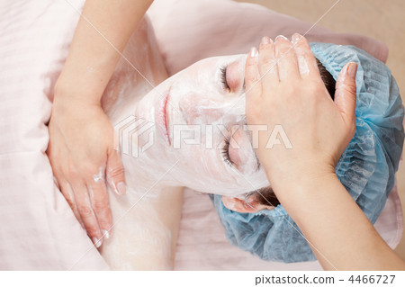 Beautiful woman with clear skin getting beauty treatment of her 4466727