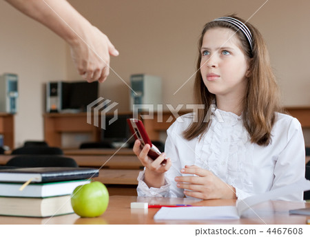 Teacher confiscates mobile phone at lesson 4467608