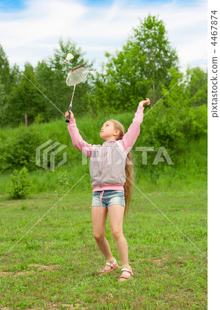Little girl playing badminton 4467874
