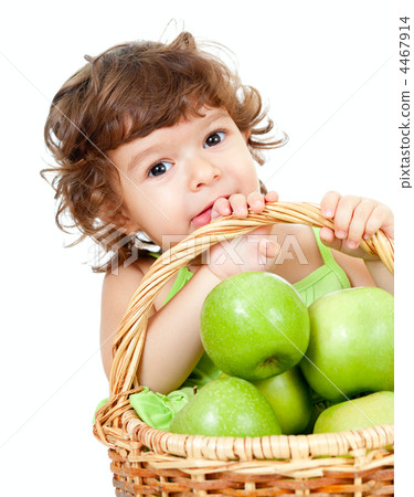 Adorable little girl with green apples in basket isolated studio Adorable little girl with green apples in basket isolated studio 4467914