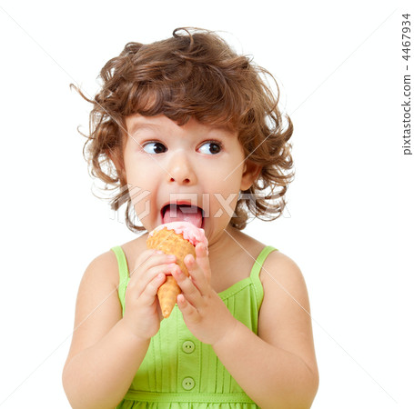 little curly girl with ice cream in studio isolated little curly girl with ice cream in studio isolated 4467934