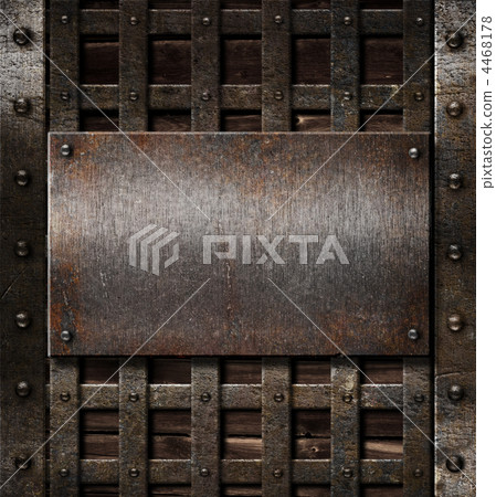 aged metal plate on wooden medieval background 4468178