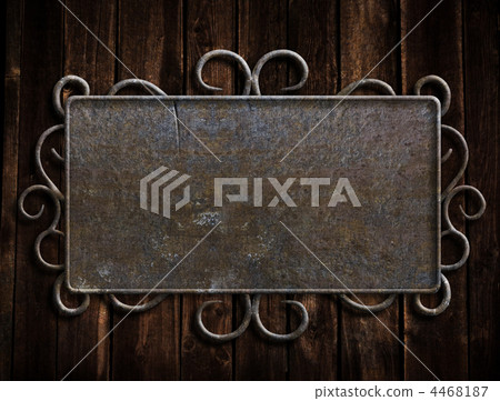 Vintage metal plate  on old oak door 4468187