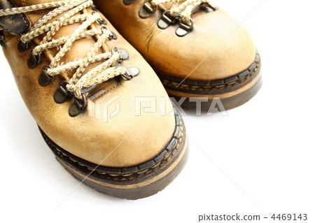 closeup of old yellow boots closeup of old yellow boots 4469143