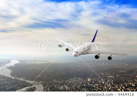 Modern airplane in the sky near Airport. Modern airplane in the sky near Airport. 4484418