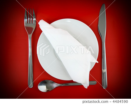 Table serving-knife,spoon,fork on red backdrop. Table serving-knife,spoon,fork on red backdrop. 4484590