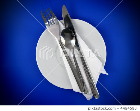 Table serving-knife,spoon,fork on blue backdrop. Table serving-knife,spoon,fork on blue backdrop. 4484593