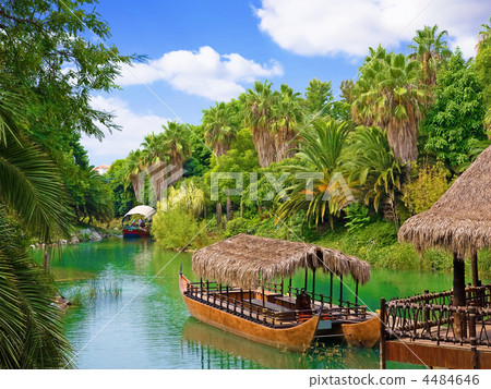 Walking canoe on river in French Polynesia. Walking canoe on river in French Polynesia. 4484646