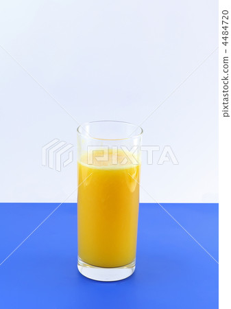 Glass of fresh orange juic? on  blue background. 4484720