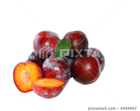 Heap of plums with green leaf. Isolated. Heap of plums with green leaf. Isolated. 4484997
