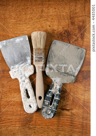 Different tools on a wooden background. Different tools on a wooden background. 4485001