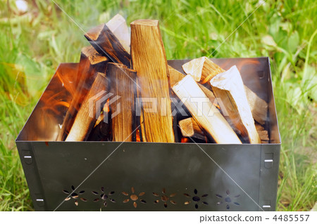 Firewoods in barbecue (grill) Firewoods in barbecue (grill) 4485557