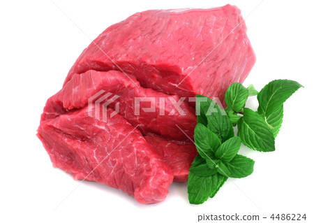 Cut of  beef steak  with green leaf. 4486224