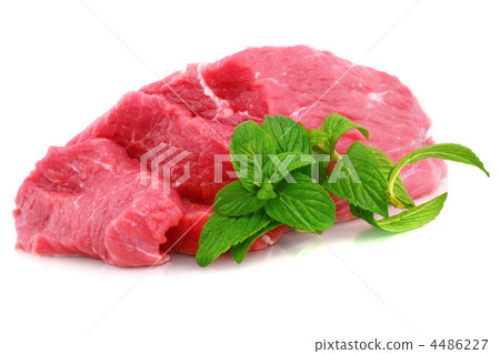 Cut of  beef steak  with green leaf. 4486227