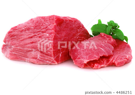 Cut of  beef steak  with green leaf. 4486251