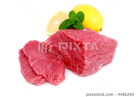 Cut of  beef steak with lemon slice. 4486269