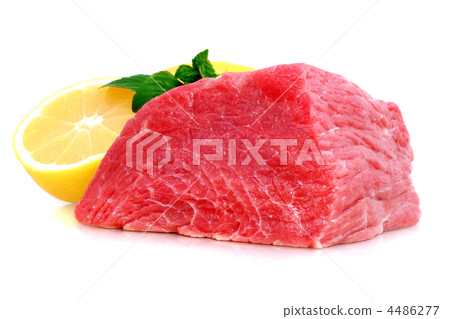 Cut of  beef steak with lemon slice. 4486277