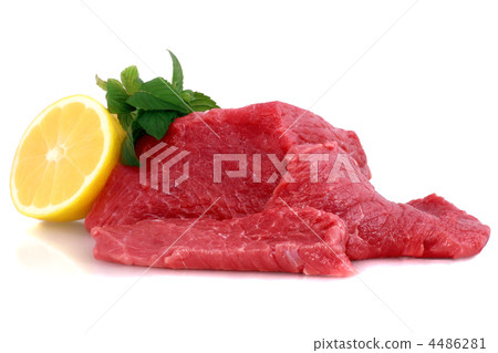 Cut of  beef steak with lemon slice. 4486281
