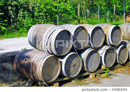 Wine barrels stacked. Italy Wine barrels stacked. Italy 4486844