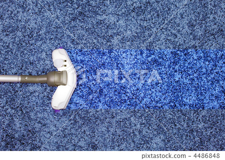 The metal pipe of vacuum cleaner in action The metal pipe of vacuum cleaner in action 4486848